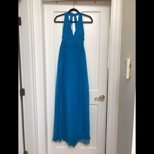 Turquoise gown. Super cute cutout sleeves.